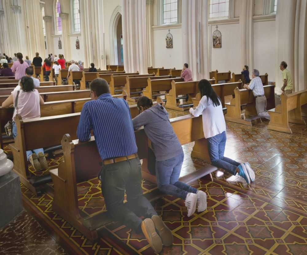 People in Church Praying